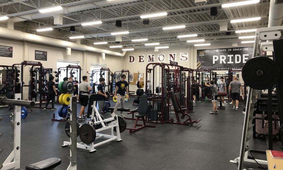 Weight+room.+The+BHS+weight+room+hosts+athletes+from+all+sports+into+an+area+in+prep+for+upcoming+seasons.+%E2%80%9CWeight+training+is+vital+for+our+athletes+across+the+board+in+the+off-season%2C%E2%80%9D+head+coach+Mark+Gibson+said.