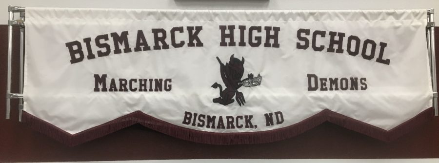 Marching Band Banner. The Screaming Demons march in different events with this banner. The banner has been used in the Santa Parade every year since it started. “This has been a tradition for many years and people love coming and listening,” BHS sophomore Zeva Burkhardsmeier said.