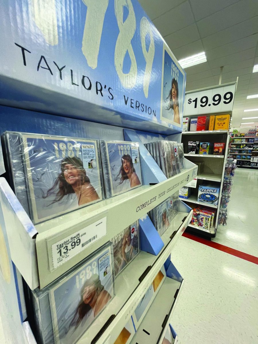 Why does Taylor Swift re-release some of her albums?
